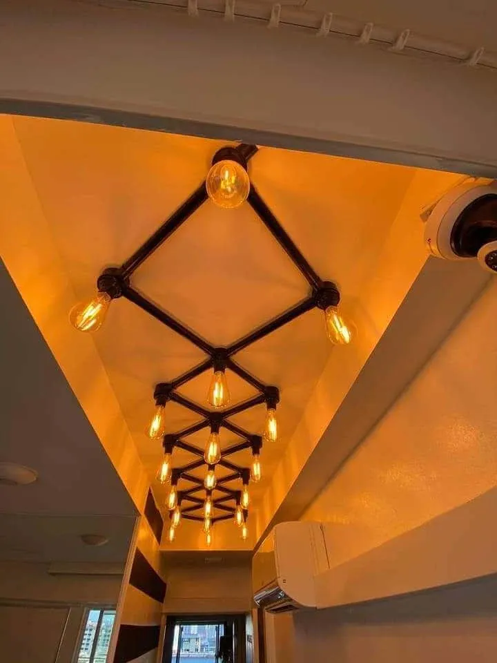 Industrial feature lighting in a hallway ceiling